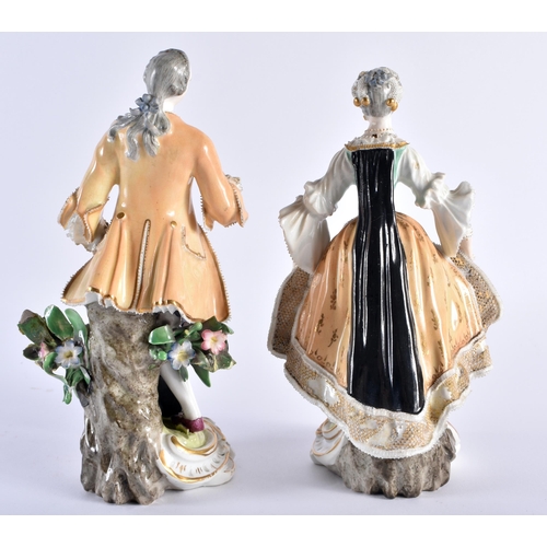 167 - Early 19th century Derby pair of figures of a gentleman and a lady dressed in Regency style, red mar... 