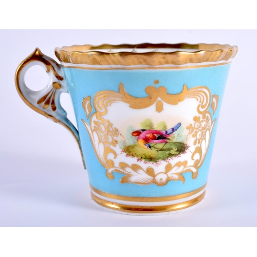 17 - AN EARLY 19TH CENTURY CHAMBERLAINS WORCESTER CUP AND SAUCER painted with birds within gilt cartouche... 