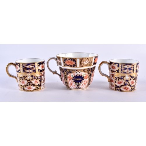 195 - Royal Crown Derby pattern 1128 two coffee cups, saucers, side plates, a coffee cup, saucer and side ... 