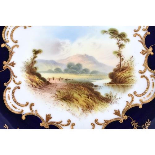 206 - Coalport plate with gilding on a cobalt blue ground, painted by P. Simpson, signed, with a scene nr.... 