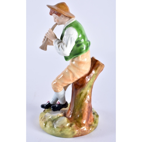 212 - Royal Worcester figure of a boy playing a pipe seated on a tree stump, painted in bright colours, ti... 