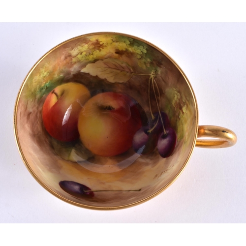 217 - Royal Worcester teacup and saucer, the cup painted inside with fruit by Harry Ayrton, signed the sau... 