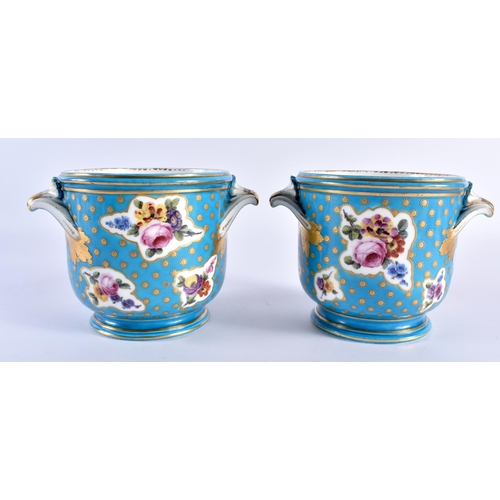 233 - Sevres pair of bottle coolers painted with asymmetric gilt panel of flowers on a turquoise ground, c... 