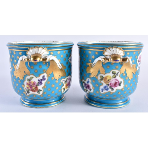 233 - Sevres pair of bottle coolers painted with asymmetric gilt panel of flowers on a turquoise ground, c... 