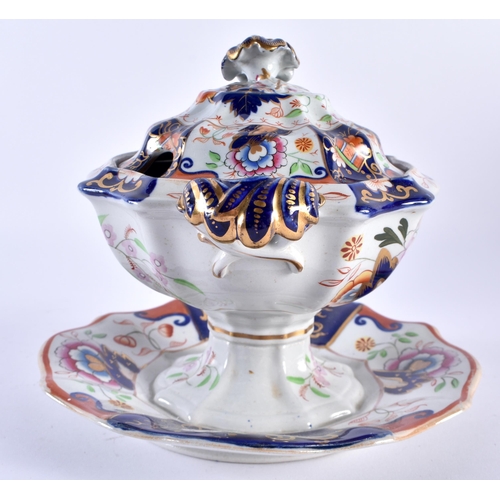 242 - 19th century English Ironstone tureen, cover and fixed stand painted in imari style colours