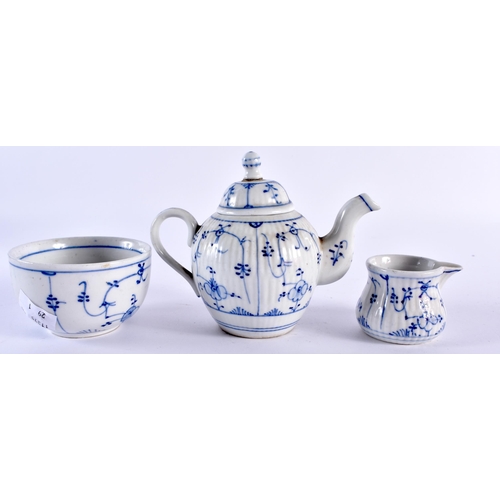 249 - Continental miniature childs tea set, decorated with periwinkle including teapot and cover, milk jug... 