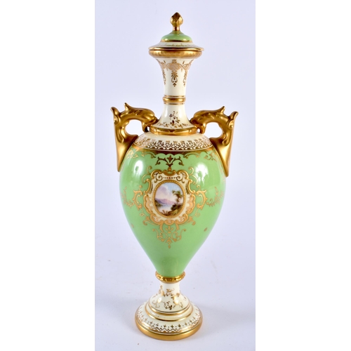 253 - Late 19th early 20th century Coalport apple green vase and cover. 23cm high