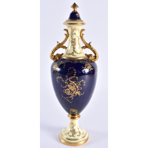 256 - Late 19th early 20th century Coalport vase and cover painted with a scene of Loch Doon on a cobalt b... 