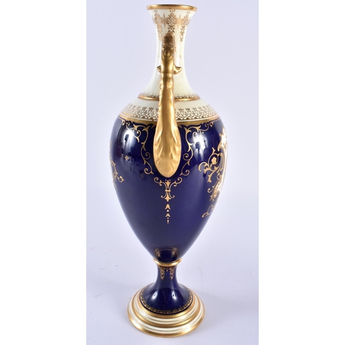 257 - Late 19th early 20th century Coalport two handled vase painted with a scene of Loch Tay on a cobalt ... 