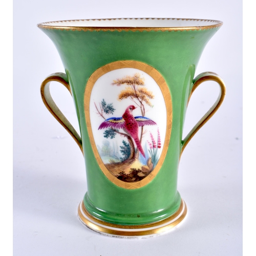 288 - Sevres two handled vase with green ground, the gilt tooled oval panel painted with birds in the mann... 