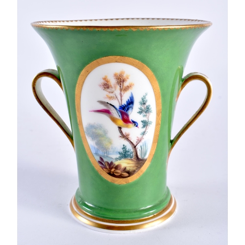 288 - Sevres two handled vase with green ground, the gilt tooled oval panel painted with birds in the mann... 