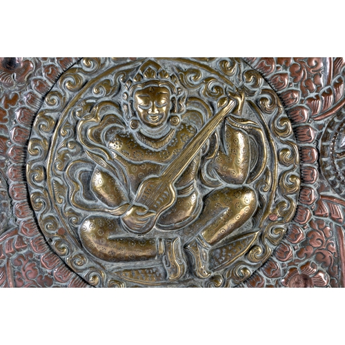 304 - A VERY LARGE 19TH CENTURY INDIAN TIBETAN COPPER AND MIXED METAL CHARGER of monumental proportions, i... 