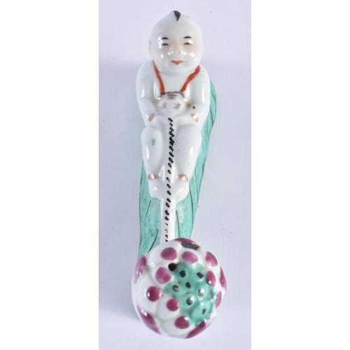 318 - A CHINESE REPUBLICAN PERIOD PORCELAIN FIGURE OF A BOY together with a green glazed dragon bowl. Larg... 