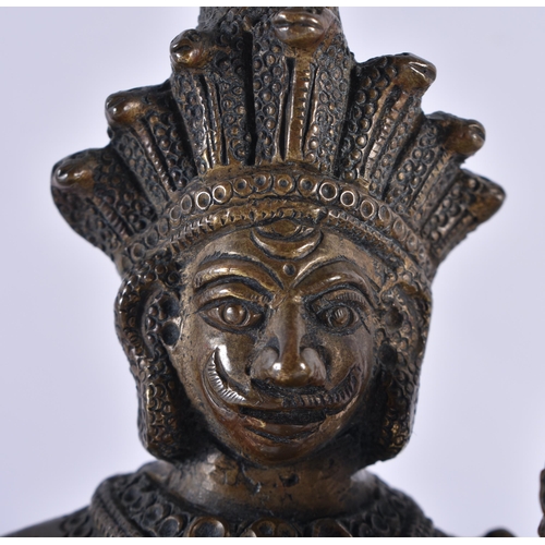 319 - A 19TH CENTURY INDIAN BRONZE FIGURE OF A HINDU DEITY modelled with an attendant. 17 cm x 10 cm.