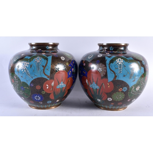 320 - A LARGE PAIR OF 19TH CENTURY JAPANESE MEIJI PERIOD CLOISONNE ENAMEL VASES decorative with panels of ... 