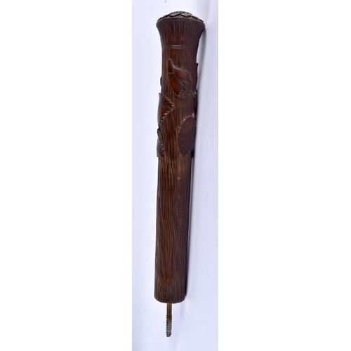 325 - A 19TH CENTURY BAVARIAN BLACK FOREST CAVED WOOD PARASOL HANDLE of naturalistic form. 27 cm long.