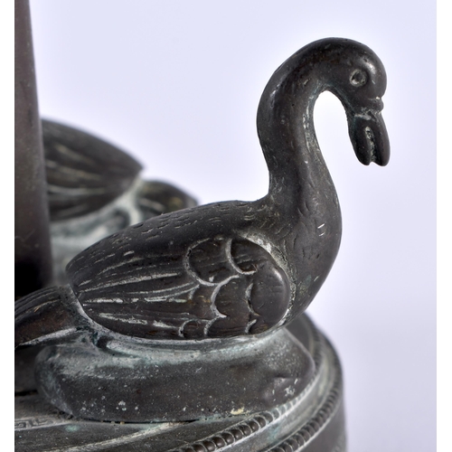 328 - A 19TH CENTURY EUROPEAN BRONZE GRAND TOUR CAMPAGNA URN modelled surrounded by ducks. 16 cm high.