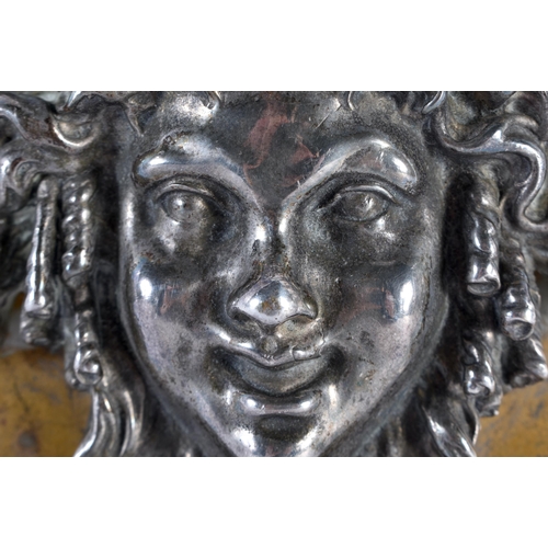 338 - A 19TH CENTURY FRENCH GRAND TOUR SILVERED BRONZE WALL PLAQUE depicting a Romanesque mask head. 18 cm... 