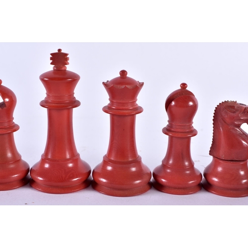 342 - A RARE RED BAKELITE PART CHESS SET. Largest 6.5 cm high. (qty)