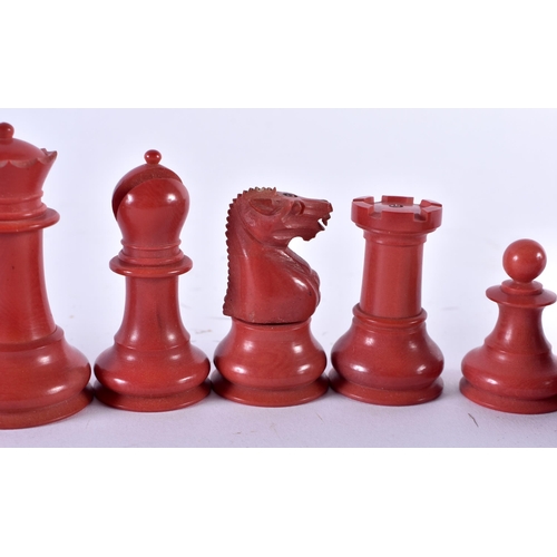 342 - A RARE RED BAKELITE PART CHESS SET. Largest 6.5 cm high. (qty)