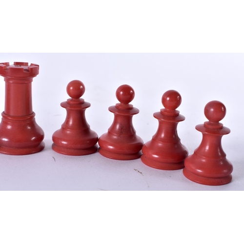 342 - A RARE RED BAKELITE PART CHESS SET. Largest 6.5 cm high. (qty)