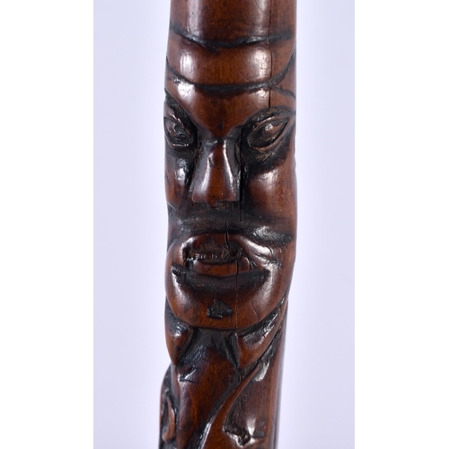 348 - A VERY UNUSUAL 18TH/19TH CENTURY CARVED WOOD MINIATURE STAFF possibly tribal, decorated all over wit... 