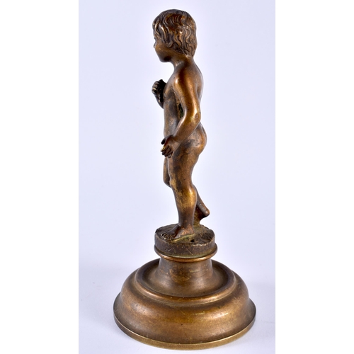 351 - AN EARLY 20TH CENTURY EUROPEAN BRONZE FIGURE OF NUDE modelled upon a circular base. 17 cm high.