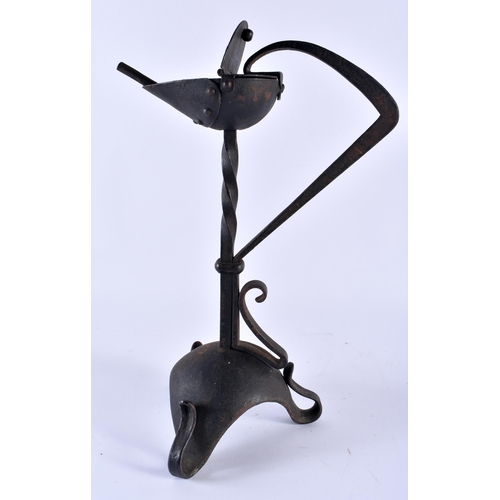 355 - A LOVELY ARTS AND CRAFTS WROUGHT IRON BETTY LAMP of organic form. 30 cm x 17 cm.