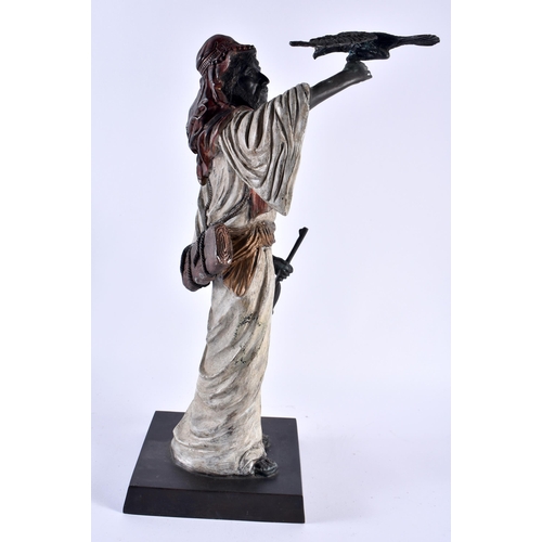 358 - A LARGE CONTINENTAL COLD PAINTED BRONZE FIGURE OF A HUNTER modelled holding aloft a hawk. 42 cm x 12... 