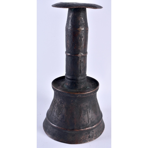 359 - A LARGE AND UNUSUAL 19TH CENTURY COPPER ALLOY CANDLESTICK engraved with fish and crucifix motifs. 33... 