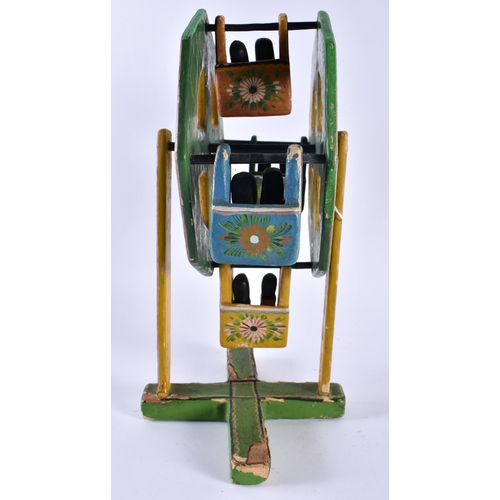 361 - A CHARMING VINTAGE SOUTH AMERICAN FOLK ART PAINTED WOOD FERRIS WHEEL. 32 cm x 15 cm.