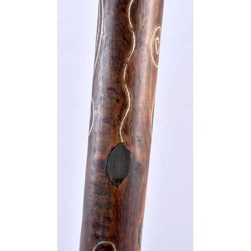 367 - A MIDDLE EASTERN MOTHER OF PEARL INLAID CARVED WOOD WALKING CANE. 90 cm long.