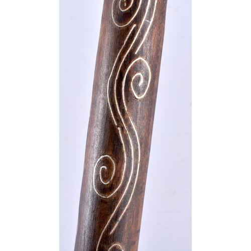 367 - A MIDDLE EASTERN MOTHER OF PEARL INLAID CARVED WOOD WALKING CANE. 90 cm long.