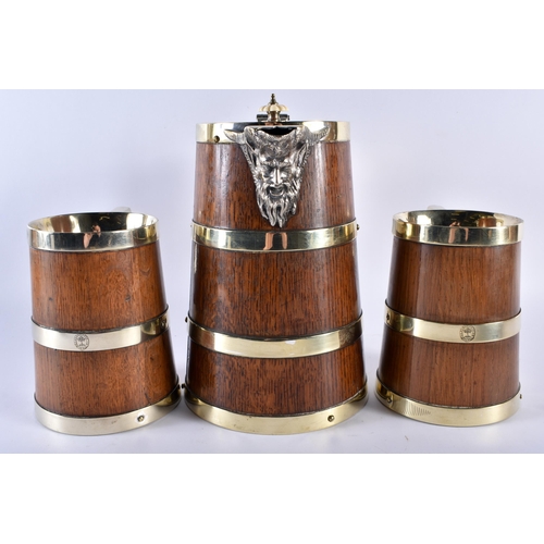 370 - A LOVELY LATE VICTORIAN SILVER PLATED COOPERED OAK ALE JUG with two matching tankards. Largest 24 cm... 