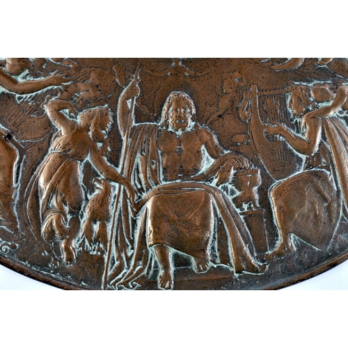 376 - A LARGE 19TH CENTURY EUROPEAN BRONZE CLASSICAL SHIELD CHARGER decorated with Romanesque scenes, of n... 