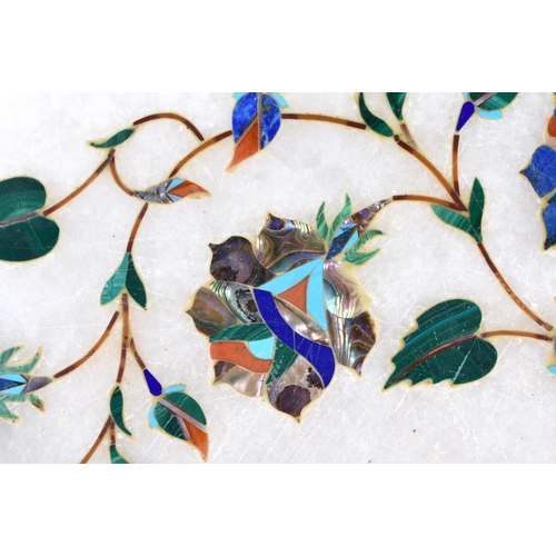 387 - AN INDIAN AGRA MARBLE LAPIS LAZULI AND MALACHITE INLAID TABLE STAND decorated with foliage. 34 cm wi... 