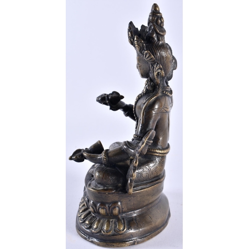 390 - A 19TH CENTURY TIBETAN NEPALESE BRONZE FIGURE OF A SEATED BUDDHA modelled holding Buddhistic items, ... 