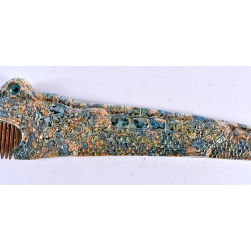 391 - A RARE 1970S FRENCH ALIGATOR COMB together with an antique agate letter opener. Largest 26 cm wide. ... 