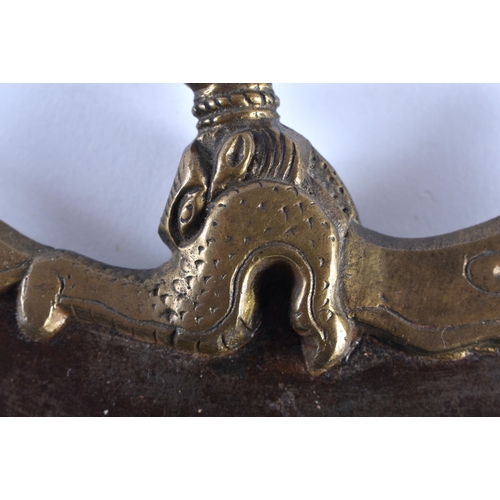 392 - A 19TH CENTURY CHINESE TIBETAN KARTIKA VAJRA BRONZE KNIFE mounted with a beast. 14 cm x 16 cm.