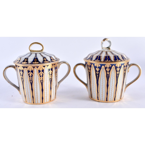 39 - A LATE 18TH CENTURY ENGLISH PORCELAIN PART TEASET comprising of teapot & two twin handled cups, cove... 