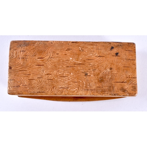 400J - A Birchwood Snuff Box with a Carved Top. 8.9cm x 4.4cm x 3cm