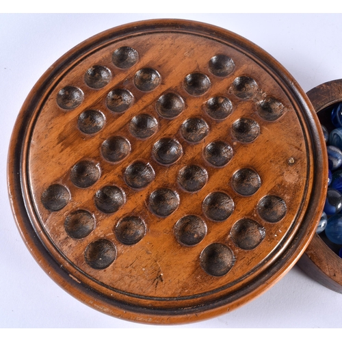 400M - A Victorian Wood Solitaire Board with a Tray containing Marbles. 10.5cm diameter