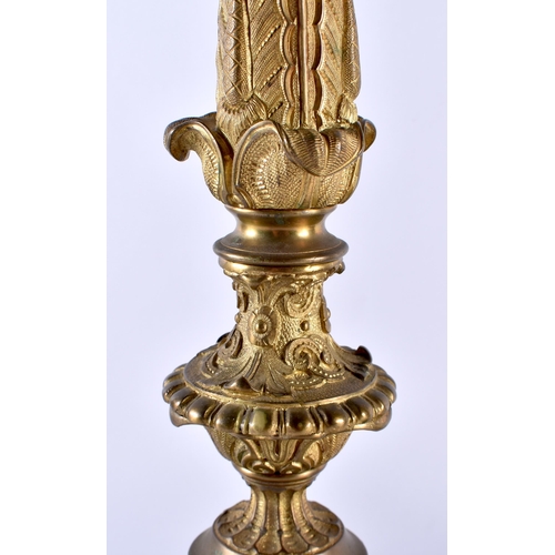 408 - A LARGE PAIR OF 19TH CENTURY EUROPEAN GILT BRONZE CANDLEABRA formed with acanthus capped columns, up... 