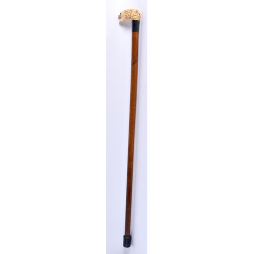 409 - A MIXED WOOD CONTINENTAL WALKING CANE together with an Antique silver collared dog head cane. 90 cm ... 