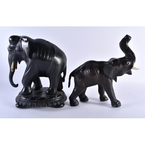 415 - A 19TH CENTURY ANGLO INDIAN COUNTRY HOUSE CARVED EBONY ELEPHANT together with a Liberty type leather... 