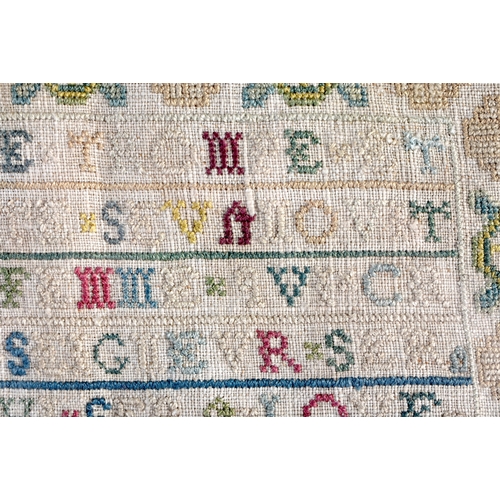 430 - A MID 18TH CENTURY ENGLISH EMBROIDERED SAMPLER dated 1738. 27 cm square.