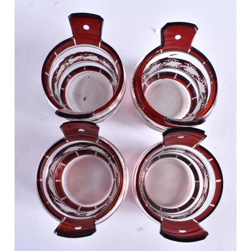 433 - AN UNUSUAL SET OF FOUR BOHEMIAN RUBY FLASH GLASS BASKET TABLE SALTS. 7.5 cm x 7 cm. (4)