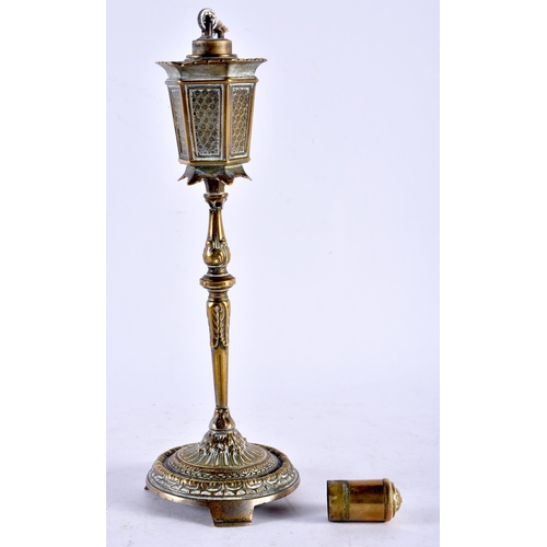 446 - A RARE ANTIQUE NOVELTY BRONZE TABLE LIGHTER formed as a Victorian lamp post. 23 cm high.