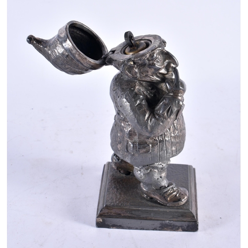 447 - AN UNUSUAL EARLY 20TH CENTURY NOVELTY SILVER PLATED PUNCH TABLE LIGHTER. 17 cm high.