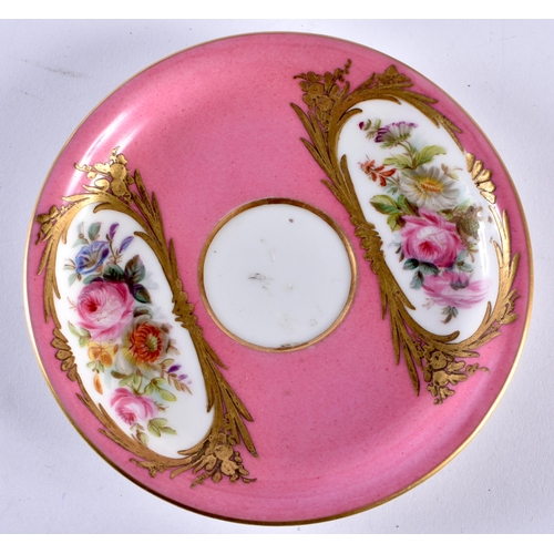 45 - A LATE 19TH CENTURY FRENCH SEVRES PORCELAIN CUP AND SAUCER painted with floral panels of a pink grou... 